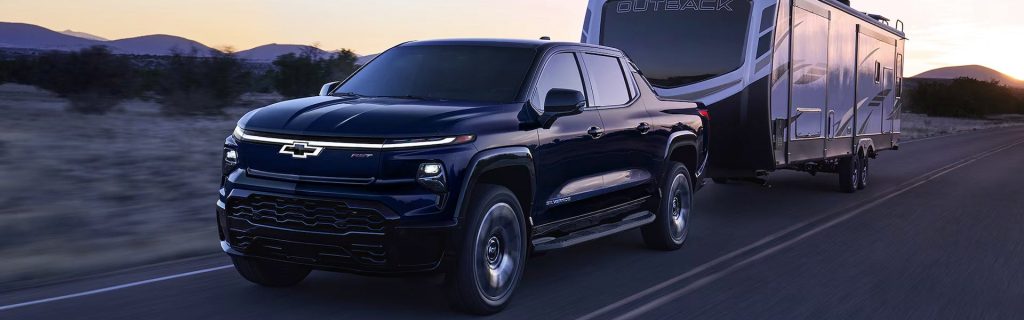 2025 Chevy Silverado EV pulling a heavy RV