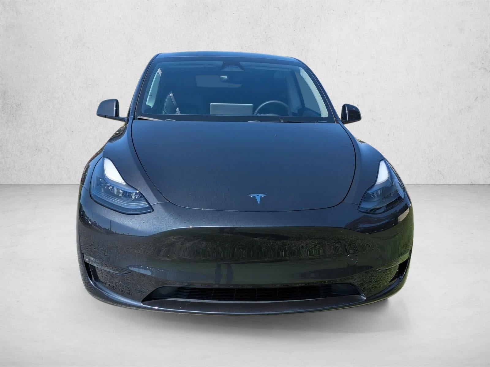 Used 2024 Tesla Model Y Long Range with VIN 7SAYGAEE6RF050038 for sale in Orlando, FL