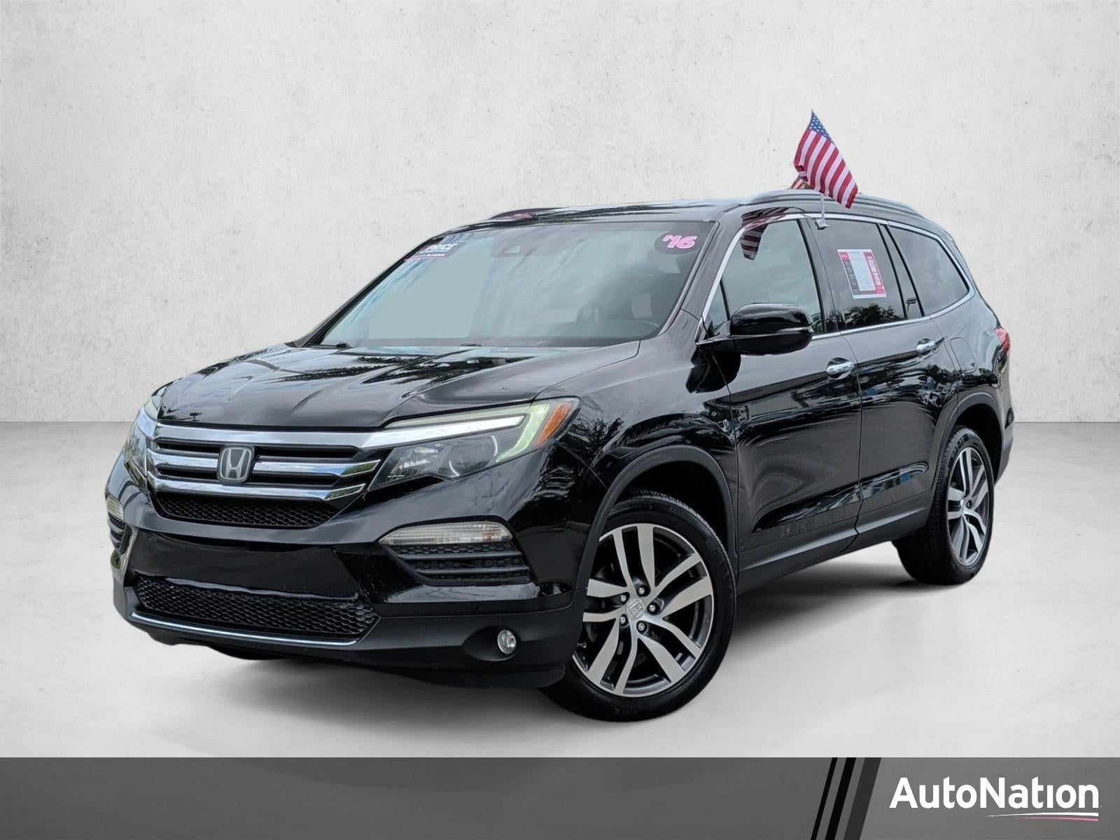 2016 Honda Pilot AWD Touring with DVD Rear Entertainment System and Navigation
