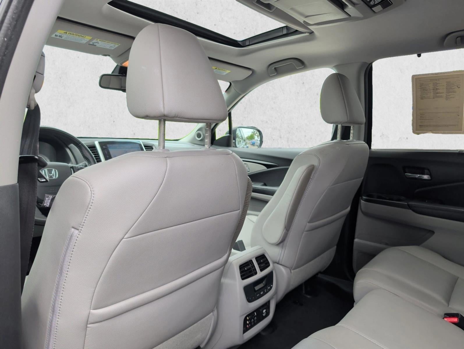 2016 Honda Pilot AWD Touring with DVD Rear Entertainment System and Navigation
