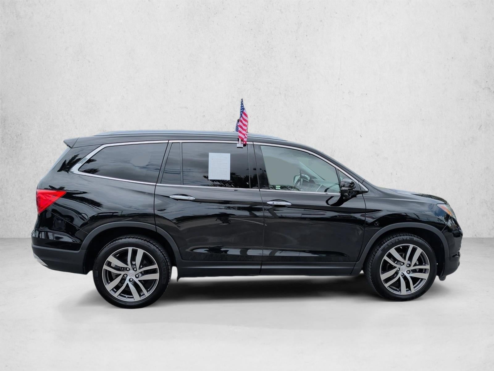 2016 Honda Pilot AWD Touring with DVD Rear Entertainment System and Navigation