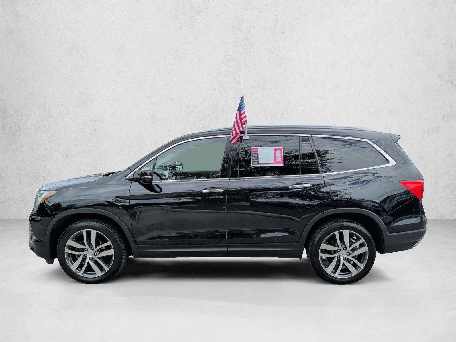 2016 Honda Pilot AWD Touring with DVD Rear Entertainment System and Navigation