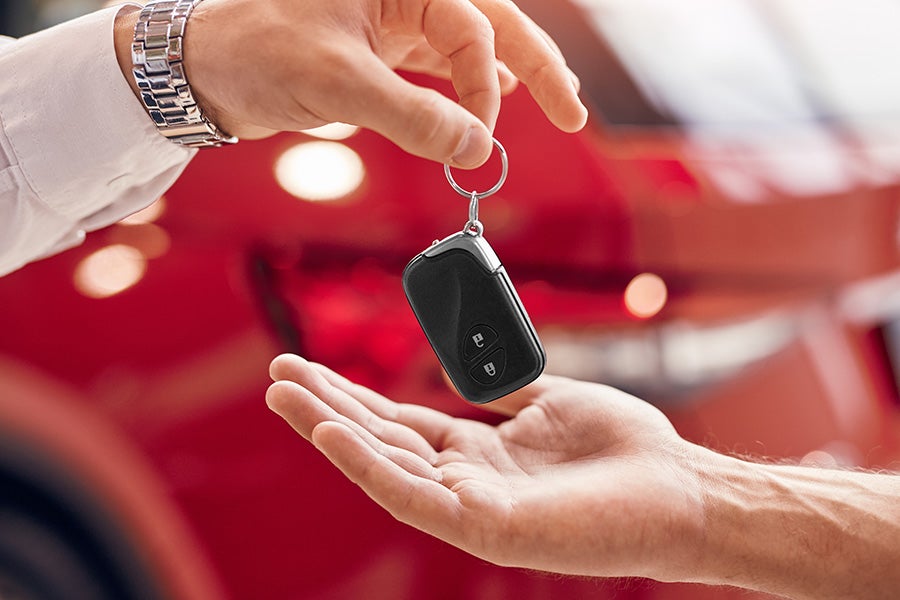 Handing over car keys at dealership